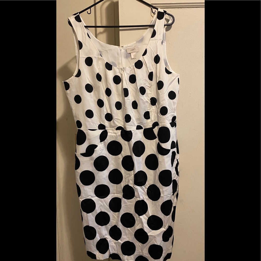 Sleeveless black and white knee length dress